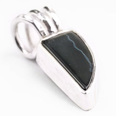 Close-up of natural Black Onyx pendant in a clean 925 sterling silver setting with simple handmade bail detail.