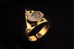 Golden Herkimer Diamond Pyramid Ring shown on black background with hammered gold plated band and pyramid bezel.