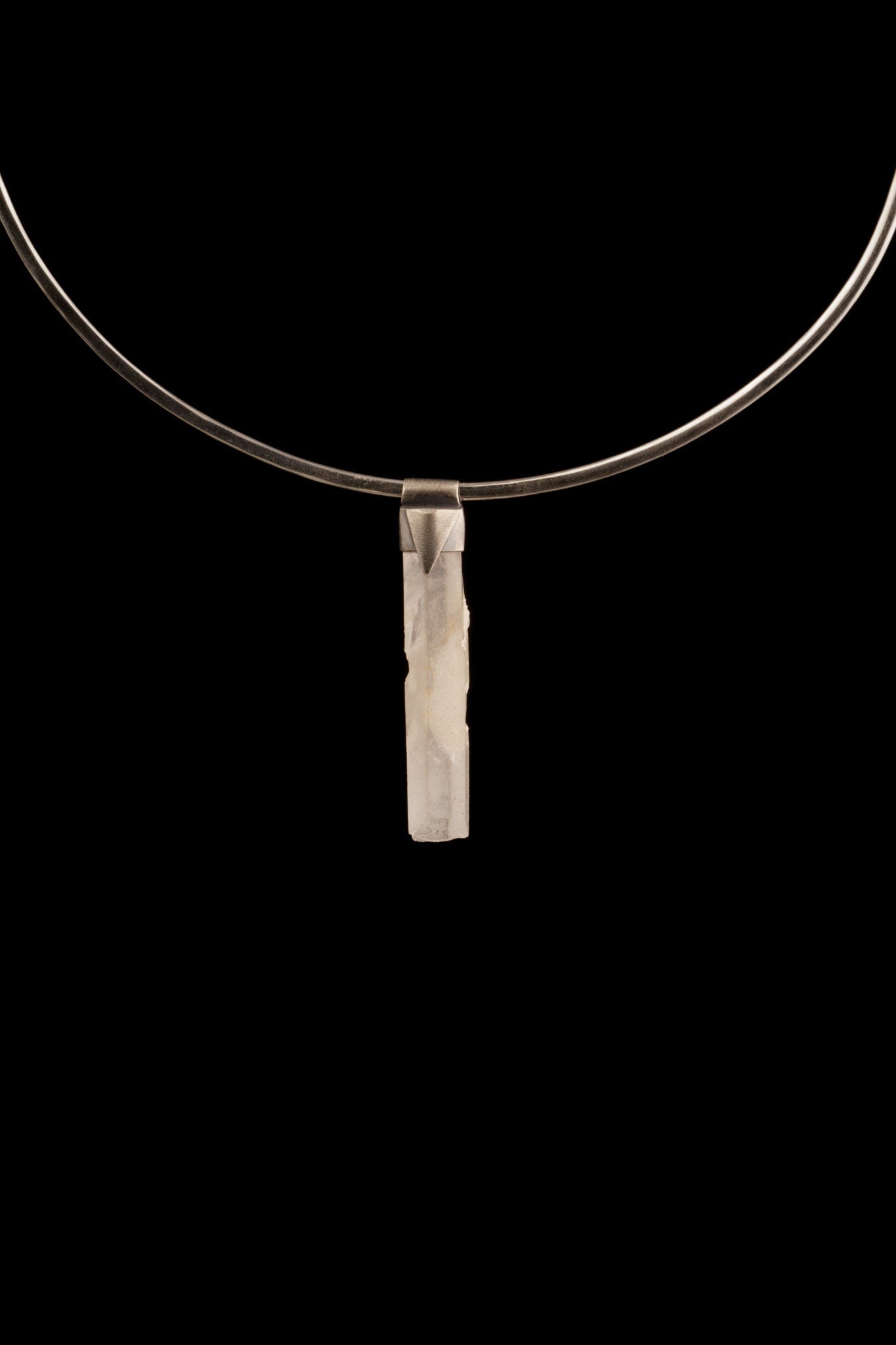 Rainbow Quartz Stack Pendant shown worn on black background with oxidized sterling silver cap and clear crystal point.