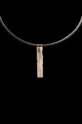 Rainbow Quartz Stack Pendant shown worn on black background with oxidized sterling silver cap and clear crystal point.