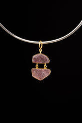 Double raw Indian Ruby pendant with mica inclusions and 16k gold-plated sterling silver setting, shown on a black cord.