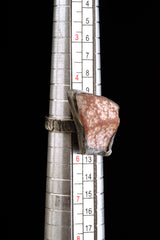 Rhodochrosite sterling silver ring shown on a mandrel for size reference, appearing around US size 5.5 to 6.