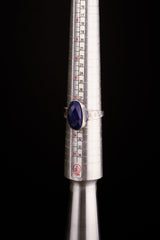 Lapis Lazuli oxidized silver ring shown beside a ruler for scale, with hammered 925 sterling silver construction.