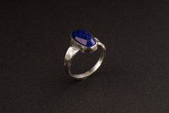 Side view of Lapis Lazuli ring showing oxidized sterling silver texture, raised bezel setting, and strong ring profile.