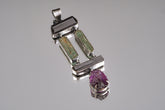 Aquamarine Tourmaline Amethyst statement pendant shown on a white background with oxidized sterling silver and hinged gemstone layout.