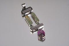 Aquamarine Tourmaline Amethyst statement pendant shown on a white background with oxidized sterling silver and hinged gemstone layout.
