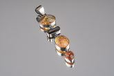 Ethiopian Opal Tourmaline Smoky Quartz Agate pendant shown on a white background with sterling silver and hinged gemstone layout.