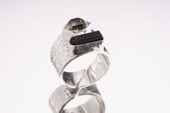 Group of A Grade Basra Pearl Rings shown on white background with textured oxidized sterling silver settings.