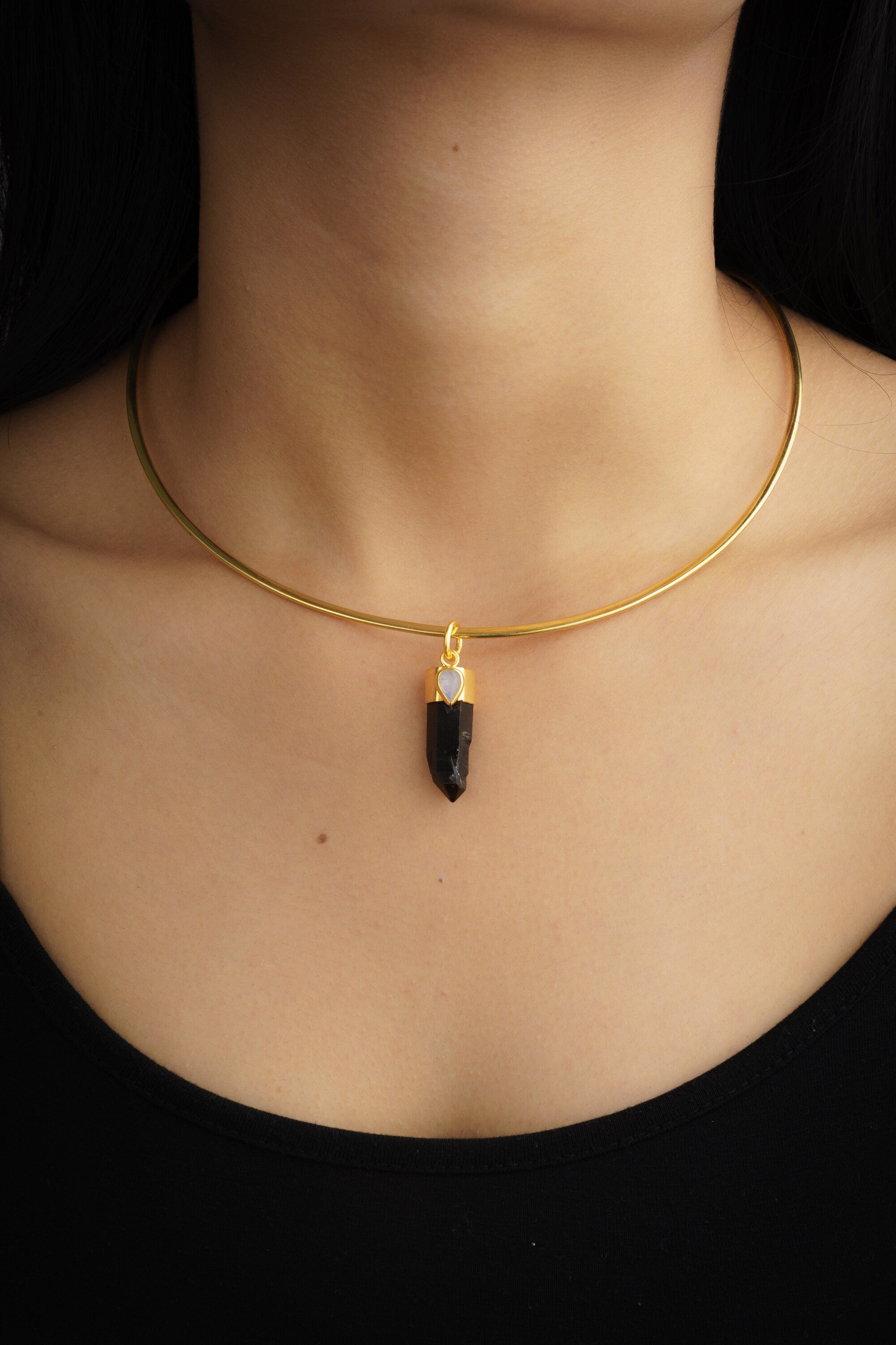 Smoky Lemurian Quartz Blue Moonstone pendant worn on a model with gold-plated sterling silver cap.