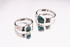 Group of Blue Apatite Textured Silver Rings shown on white background with handmade sterling silver bands.