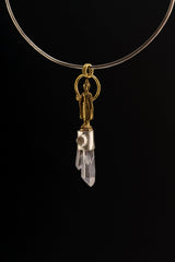 Buddha Twin Quartz Herkimer Diamond pendant shown on black background with softly oxidized silver and brass detail.