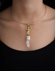 Buddha Twin Quartz Herkimer Diamond talisman shown worn on the chest with black cotton cord and clear crystal body.