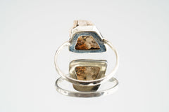 Back view of Sunstone sterling silver ring showing the circular band shape and raised handmade gemstone setting.