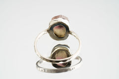 Pink Tourmaline Sterling Silver Ring shown from the back with natural pink stone and clean handmade silver setting.