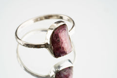 Pink Tourmaline Silver Ring shown worn on hand with natural pink gemstone and sturdy silver setting.