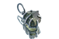 Green Tourmaline Claw Pendant on white background with oxidized sterling silver and natural deep green crystal.