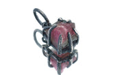 Pink Tourmaline Rubellite Claw Pendant on white background with oxidized sterling silver and natural rose-pink crystal.