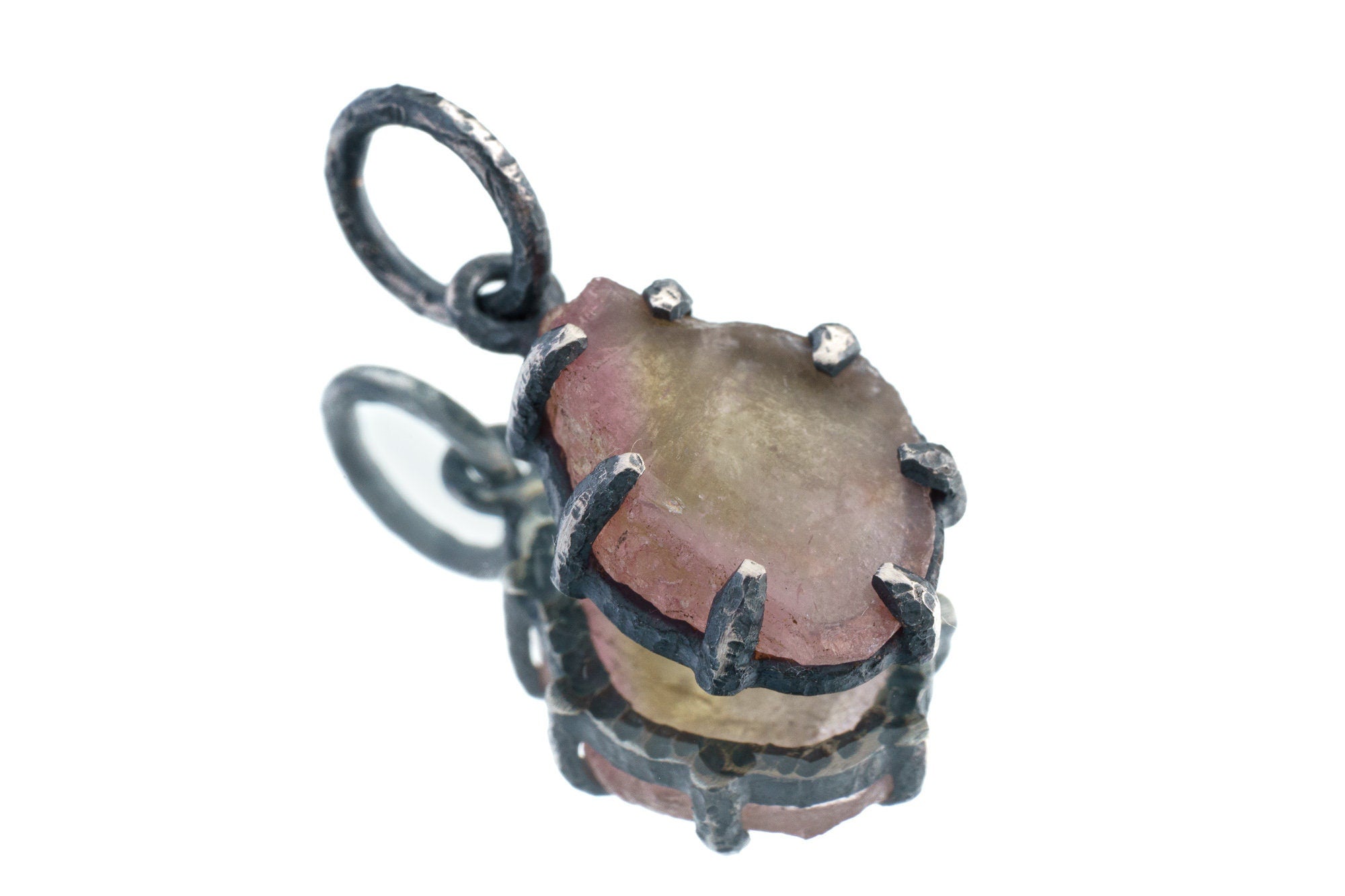 Watermelon Tourmaline Claw Pendant on white background with oxidized sterling silver setting and natural pink-green stone.