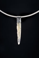 Nepal Chlorite Rutile Phantom Quartz Stack Pendant shown on black background with oxidized sterling silver cap and clear crystal point.