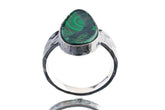 Malachite ring in oxidized 925 sterling silver with hammered texture, open-back bezel, and bold green banded stone.