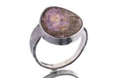 Side view of Sugilite ring showing oxidized sterling silver texture, raised bezel setting, and strong ring profile.