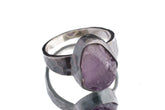 Amethyst ring in oxidized 925 sterling silver with hammered texture, open-back bezel, and purple quartz centre stone.