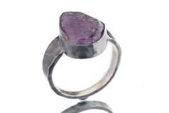 Side view of Amethyst ring showing oxidized sterling silver texture, raised bezel setting, and strong ring profile.