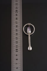 Vera Cruz Amethyst sterling silver spoon pendant shown beside a ruler for scale with solid cast silver body.