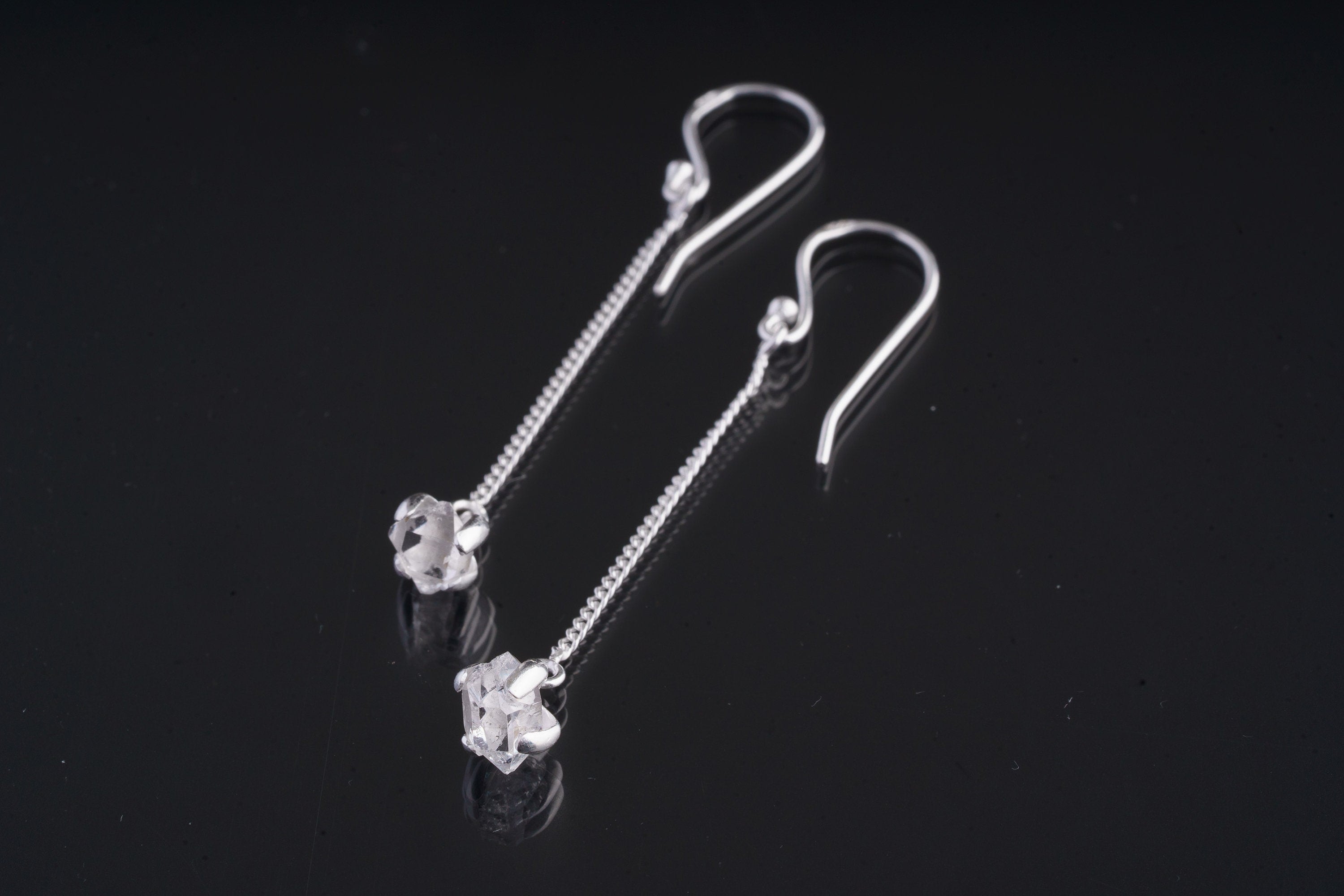 Herkimer Diamond Quartz dangle earrings in polished 925 sterling silver with fine hook fittings and claw-set crystals.