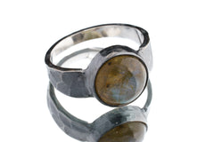 Labradorite hammered ring in oxidized 925 sterling silver with open-back bezel and shifting smoky-gold flash.