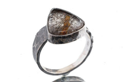Side view of Rutilated Quartz oxidized silver ring showing hammered band texture and strong masculine profile.