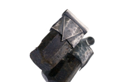 Himalayan Dravite Tourmaline Stack Pendant shown on a light background with oxidized sterling silver cap and dark brown crystal.