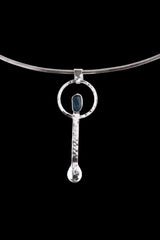 Blue Apatite ritual spoon pendant shown on a silver choker with solid 925 sterling silver and bright blue stone detail.