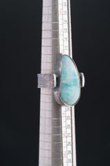 Larimar oxidized silver ring shown beside a ruler for scale, with rugged hammered 925 sterling silver construction.