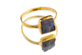 Gold-plated 925 sterling silver Pyrite ring shown worn on the hand, with a metallic dark-gold stone and sturdy handmade band.