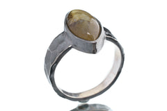 Side view of Labradorite ring showing oxidized sterling silver texture, raised bezel setting, and strong ring profile.
