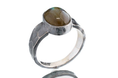 Side view of Labradorite ring showing bark-like oxidized silver texture, coiled tendrils, and raised circular stone.