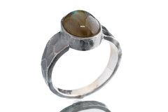 Side view of Labradorite ring showing bark-like oxidized silver texture, coiled tendrils, and raised circular stone.