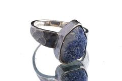 Side view of Dumortierite oxidized silver ring showing rugged hammered band texture and strong masculine profile.