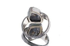 Back view of Dumortierite ring showing open-back bezel construction and hammered oxidized silver band.