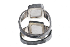 Back view of Selenite oxidized silver ring showing rugged hammered band texture and strong masculine profile.