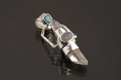 Two Sided Crystal Spinner Pendant shown on black background with high-polish sterling silver and mixed gemstone construction.