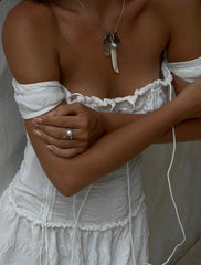 South Sea Pearl Antique Bone Spoon Pendant shown worn on a model as a symbolic ritual talisman.