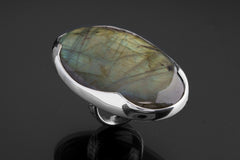 Side view of XXL Labradorite adjustable ring showing textured silver band, thick setting, and open-back construction.