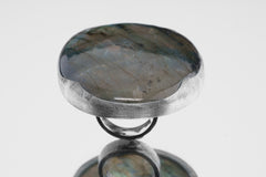 XXL Labradorite adjustable silver ring shown from the front, with waved bezel and strong oval stone presence.