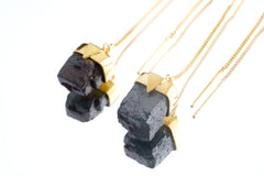 Gold-plated Pyrite earrings shown on a white background with fine hook ear wires and small bezel-set stones.