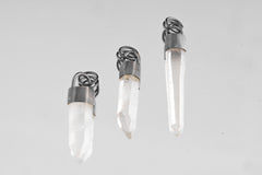 Three Australian Clear Quartz point pendants in oxidized sterling silver, showing natural variation in crystal length and shape.