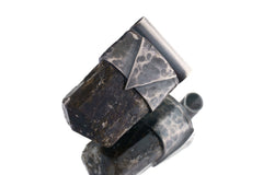 Himalayan Dravite Tourmaline Stack Pendant shown on white background with smoky brown-black crystal and oxidized silver cap.