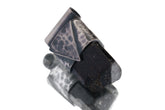 Himalayan Dravite Tourmaline Stack Pendant shown on white background with oxidized sterling silver cap and dark terminated crystal.