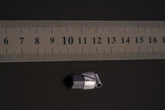 Himalayan Dravite Tourmaline Stack Pendant shown beside a ruler for scale with 2.5 mm tubular bail and oxidized silver cap.
